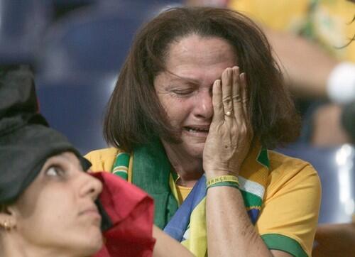 A Brazilian supporter cries at the end o