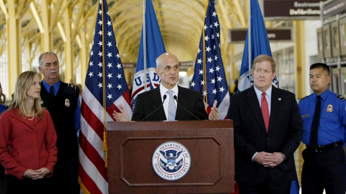 Kathy Kraninger, left, is President Trump's nominee to be director of the Consumer Financial Protection Bureau. She's shown here at a 2008 event when serving as deputy assistant secretary for policy at the Department of Homeland Security.