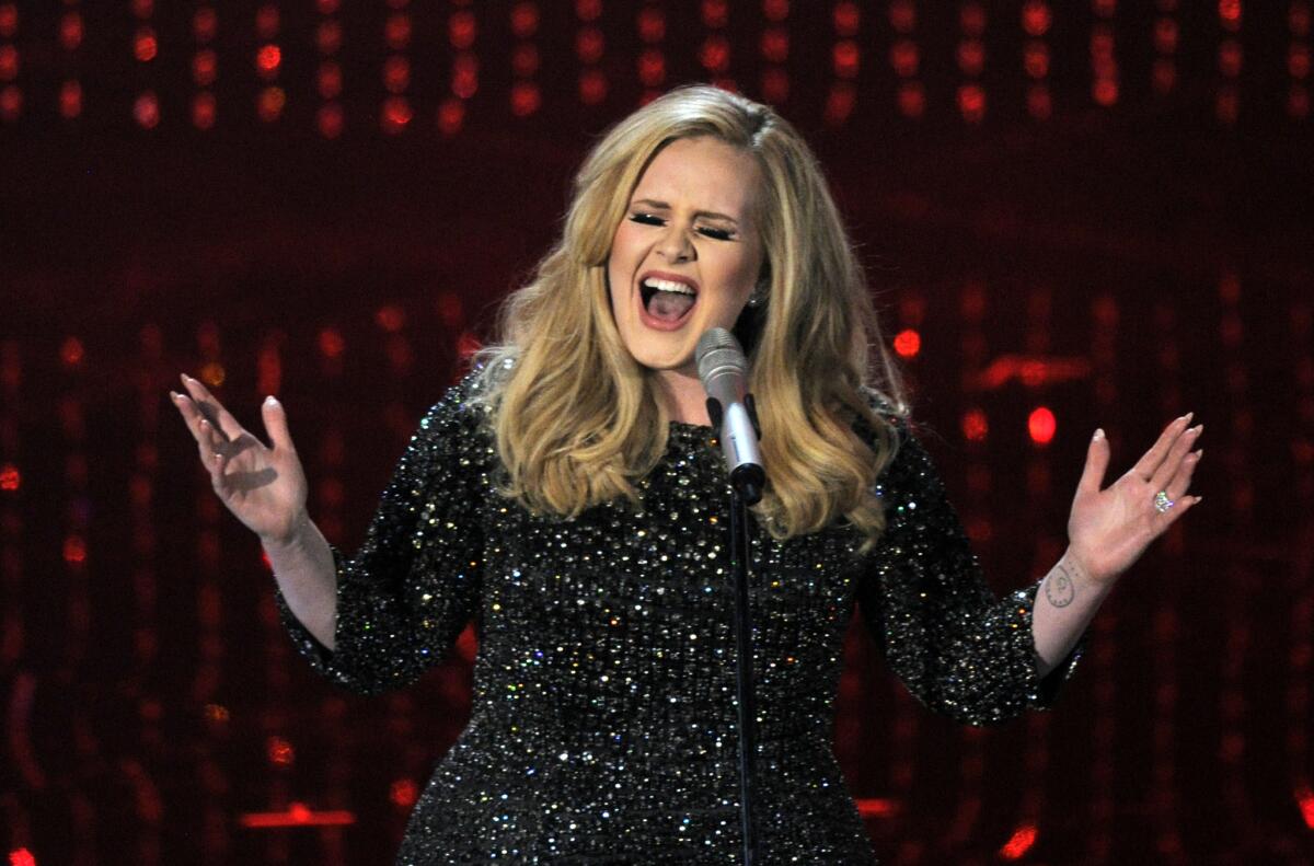 Adele performing at the Oscars in 2013.