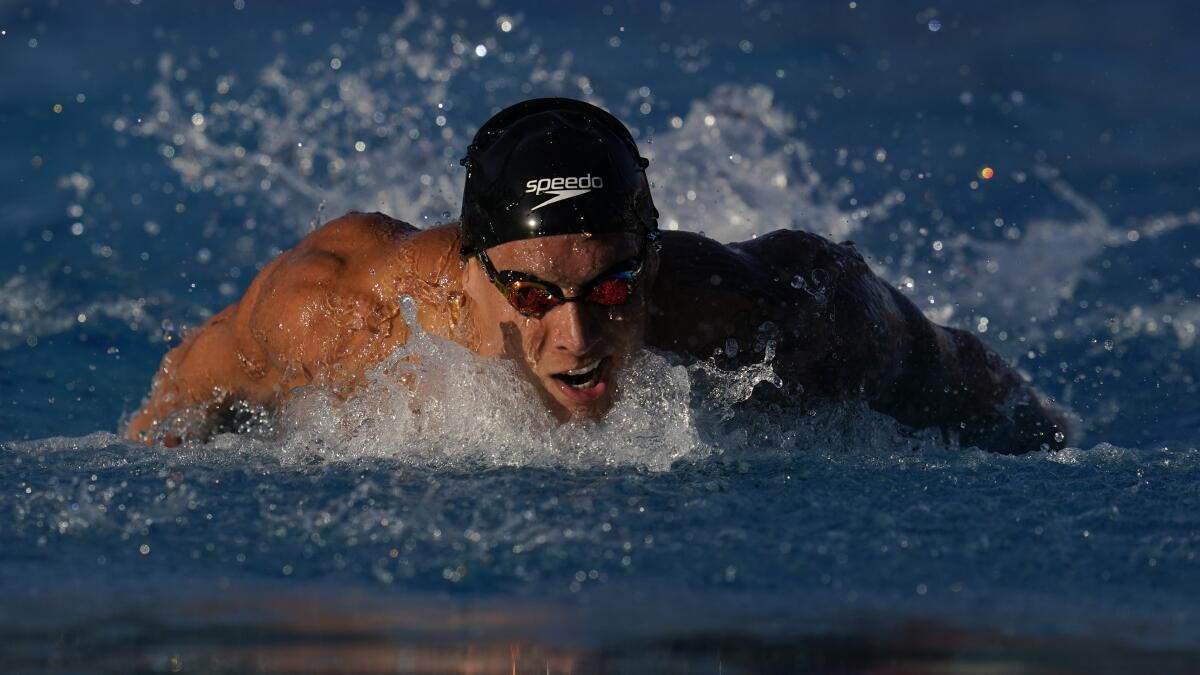 Caeleb Dressel competes in the men's 100-meter butterfly prelims at the TYR Pro Swim Series meet.