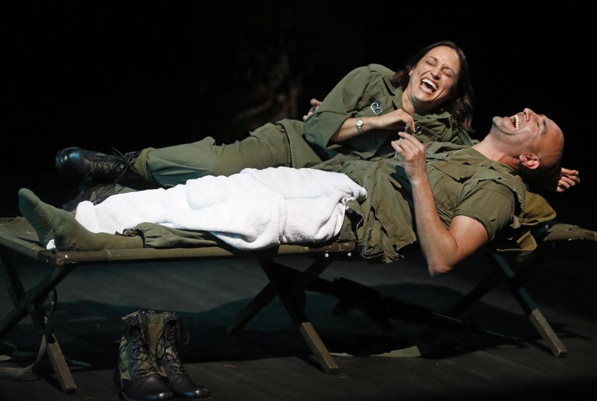 Caro Zeller as Ginny, Olazábal as Pop. , is a portrait of a multi-generational military family. (Genaro Molina / Los Angeles Times)