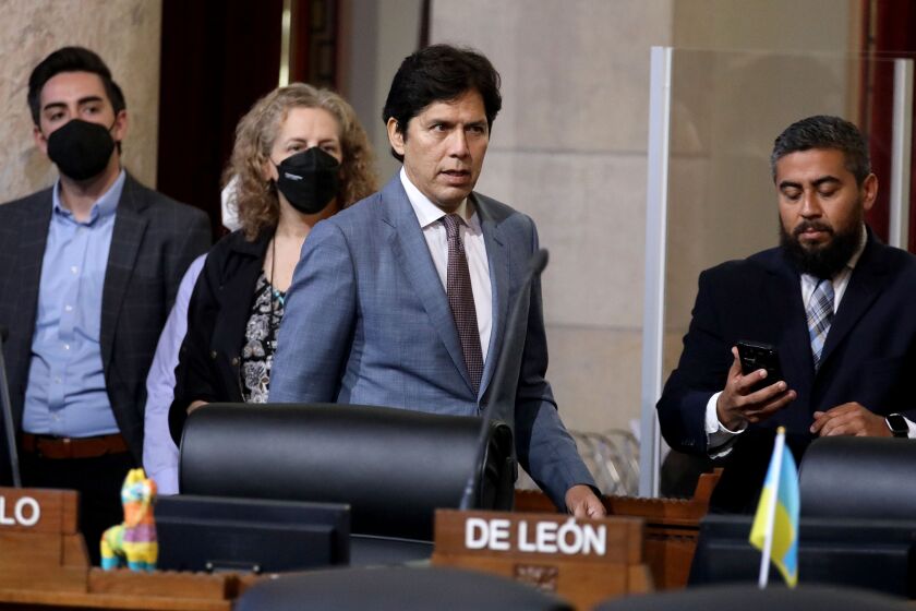 LOS ANGELES, CA - OCTOBER 11: Councilmember District 14 - Kevin de Leon enters the Los Angeles City Council meeting at Los Angeles City Hall on Tuesday, Oct. 11, 2022 in Los Angeles, CA. Protestors want the resignation of Los Angeles Councilmembers Nury Martinez, Kevin de Leon and Gil Cedillo. Martinez made racist remarks about Councilmember Mike Bonin son in the recording as her colleagues, Councilmembers Kevin de Leon and Gill Cedillo, laughed and made wisecracks. (Gary Coronado / Los Angeles Times)