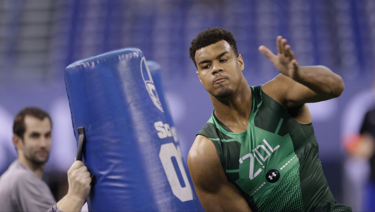 Oregon defensive lineman Arik Armstead runs a drill at the NFL scouting combine in Indianapolis on Feb. 22.