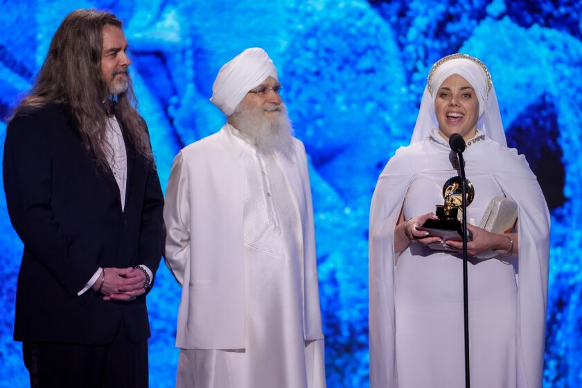 LOS ANGELES, CALIFORNIA - FEBRUARY 5: 65th GRAMMY AWARDS - Winners of new age, ambient or chant album White Sun on stage at the Grammy pre-telecast at the Microsoft Theather on February 5, 2023. -- (Photo by Robert Gauthier / Los Angeles Times)
