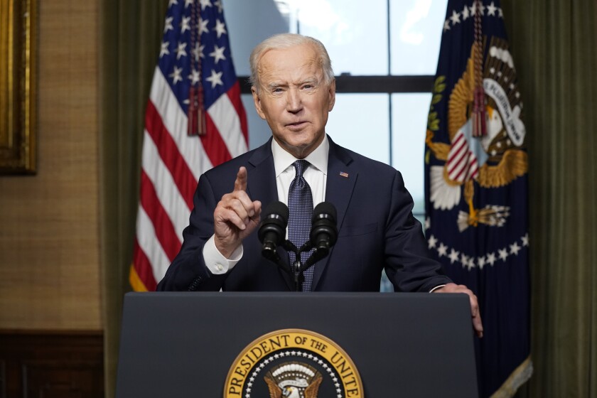 President Biden speaks at a lectern from the Treaty Room in the White House
