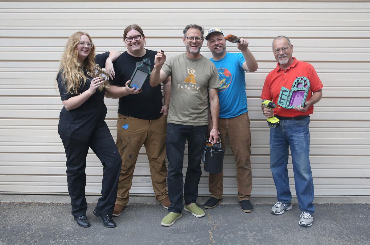 Anaheim Halloween Parade volunteers, from left, Janey Ellis, Patrick Arlt, Kevin Kidney, Jody Daily, and Bob Sanchez.