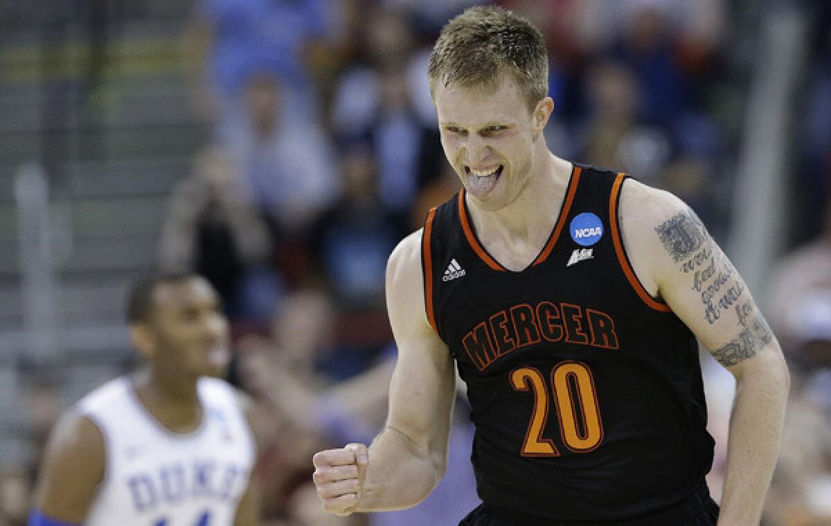 Mercer forward Jakob Gollon celebrates after scoring a basket during the Bears' upset victory over Duke in the second round of the NCAA tournament on March 21.