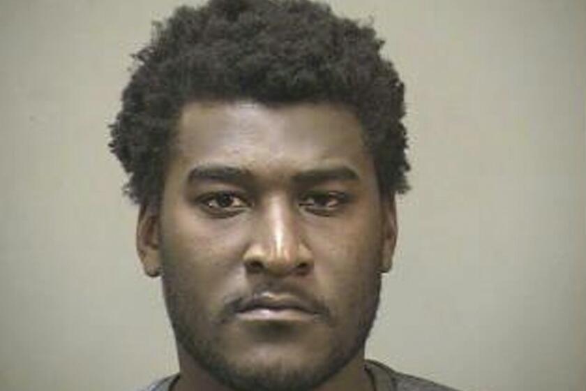 Justin Blackmon is pictured in a Edmond, Okla., police booking photo by dated July 23.