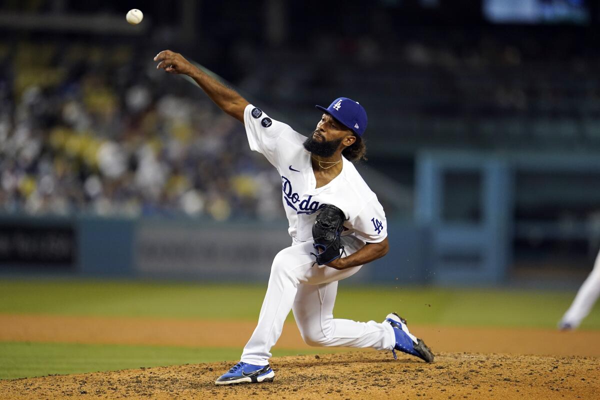 Dodgers pitcher Andre Jackson delivers against the Colorado Rockies on Friday.