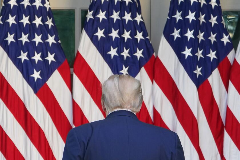 TOPSHOT - US President Donald Trump makes his way from the podium after the daily briefing on the novel coronavirus, which causes COVID-19, in the Rose Garden of the White House on April 15, 2020, in Washington, DC. (Photo by MANDEL NGAN / AFP) (Photo by MANDEL NGAN/AFP via Getty Images)