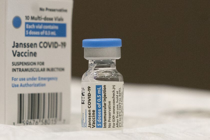 FILE - In this March 3, 2021 file photo, a vial of the Johnson & Johnson COVID-19 vaccine is displayed at South Shore University Hospital in Bay Shore, N.Y. U.S. health advisers are meeting Friday, Oct. 15, to tackle who needs boosters of Johnson & Johnson's single-shot COVID-19 vaccine and when. Advisers to the Food and Drug Administration also will examine data suggesting that booster of a competing brand might provide better protection. (AP Photo/Mark Lennihan, File)