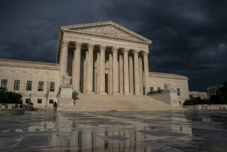 FILE - In this June 20, 2019 file photo, the Supreme Court is seen under stormy skies in Washington. (AP Photo/J. Scott Applewhite)