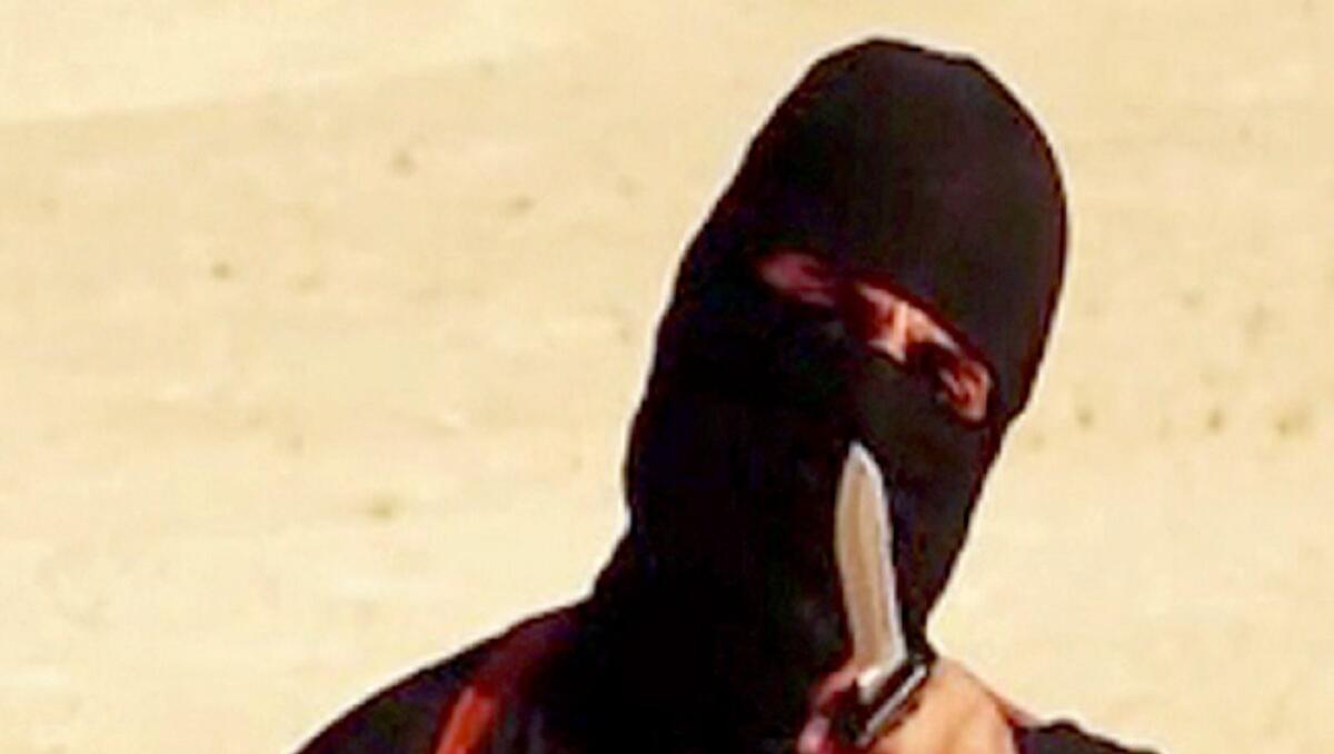 A masked militant is shown in a screengrab from a video released by Islamic State. The FBI believes it has identified the man who killed U.S. journalists James Foley and Steven Sotloff.