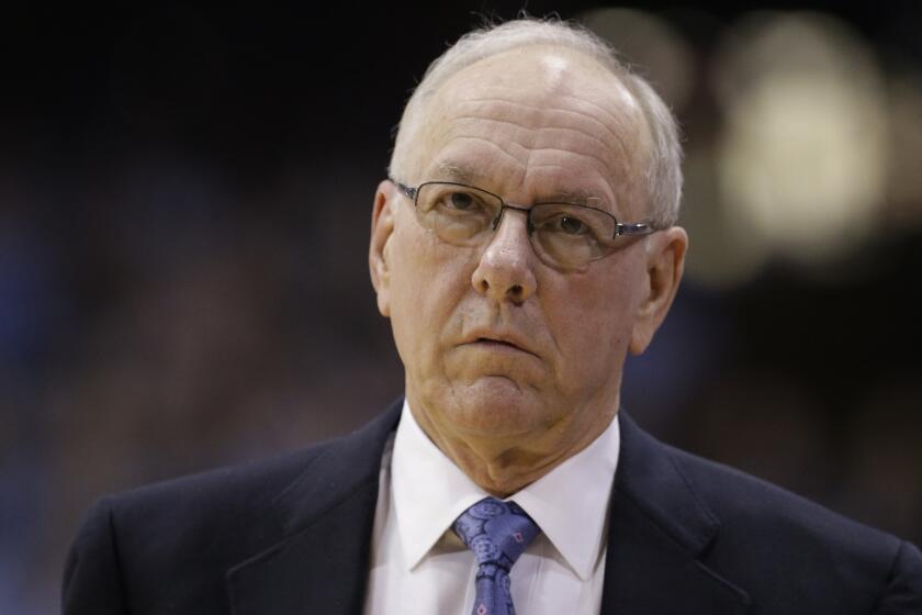 Syracuse Coach Jim Boeheim looks on during a game against North Carolina on Jan. 26, 2015.