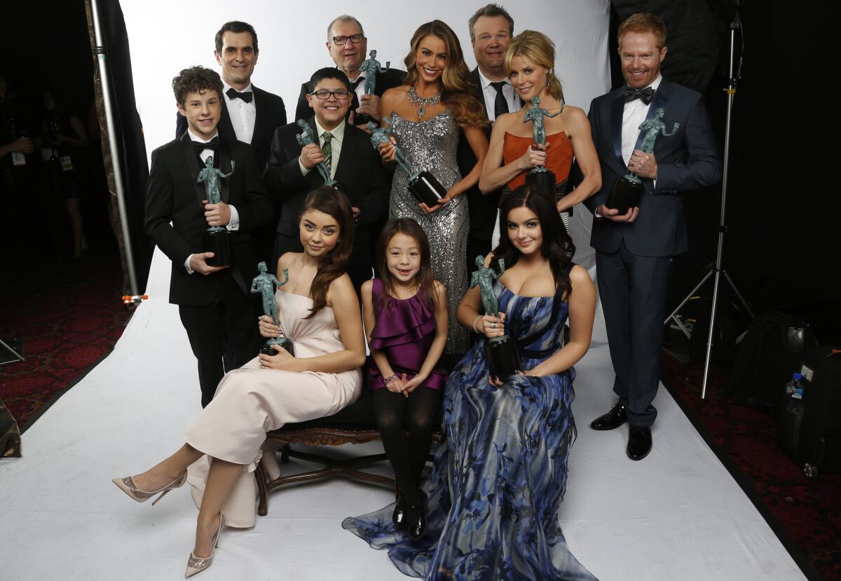 The cast members of "Modern Family," SAG Award winners for outstanding performance by an ensemble in a comedy series, pose in The Times' photo booth at the awards show.