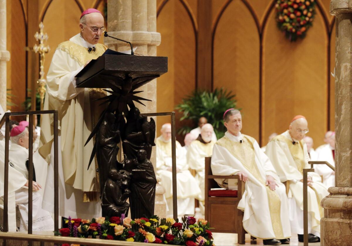 Archbishop Carlo Maria Viganò, shown conducting Mass in 2014