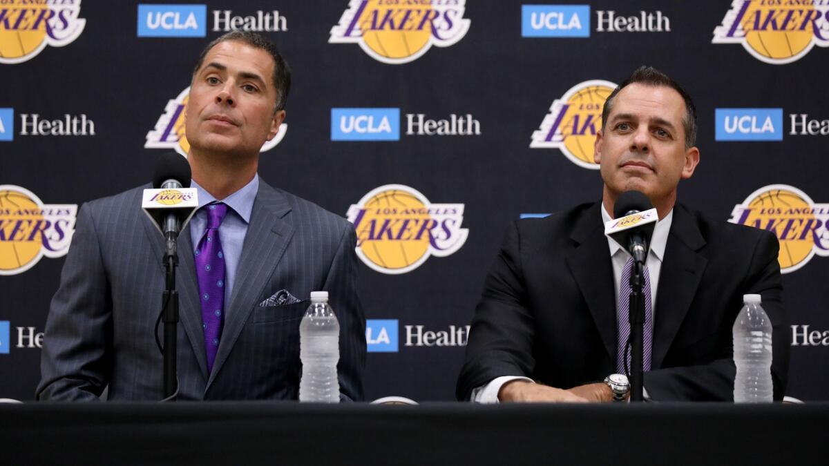 Lakers general manager Rob Pelinka, left, and coach Frank Vogel field questions at a news conference in El Segundo on May 20. Finding players to fit Vogel's scheme will be among the team's priorities heading into free agency.