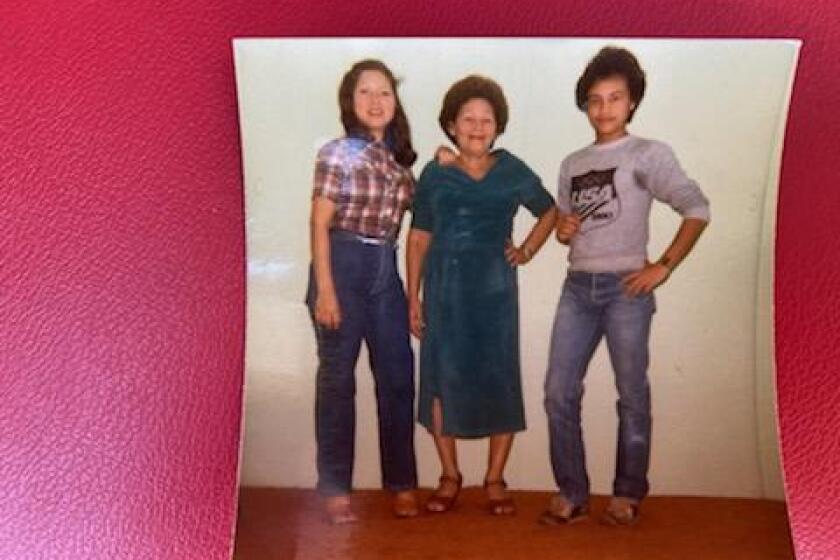 Carlos Ernesto Escobar Mejia with his sister Rosa Escobar (left) and their mother shortly after coming to the United States.