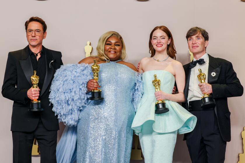 Hollywood, CA - March 10: Robert Downey Jr., Da'Vine Joy Randolph, Emma Stone and Cillian Murphy in the deadline room at the 96th Annual Academy Awards at the Dolby Theatre at Hollywood & Highland Center in Hollywood, CA, Sunday, March 10, 2024. (Dania Maxwell / Los Angeles Times)