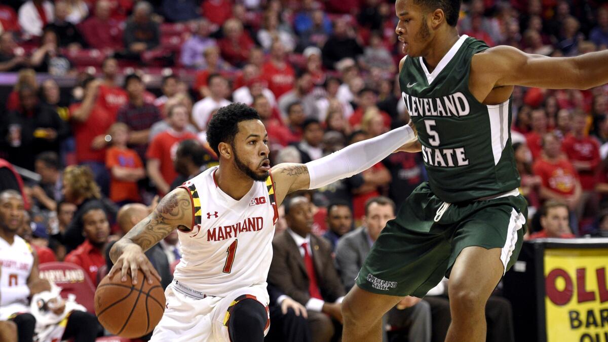 Maryland guard Jaylen Brantley (1) tries to dribble past Cleveland State forward Jibri Blount (5) during the first half Saturday.