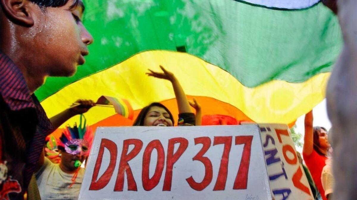 Participants dance at a rally in New Delhi demanding the end of Section 377 of the Indian Penal Code, which makes same-sex relations illegal.