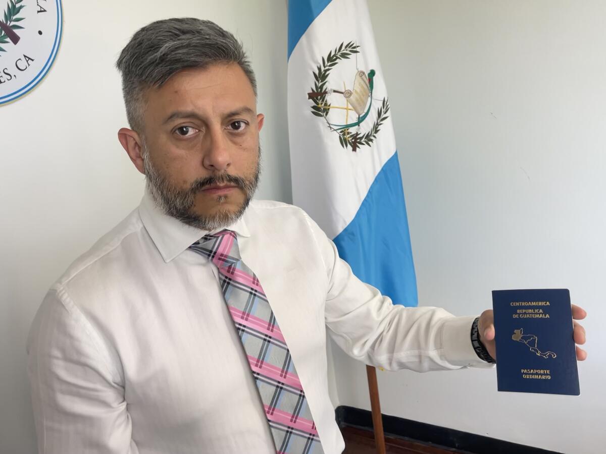 A man holds a passport