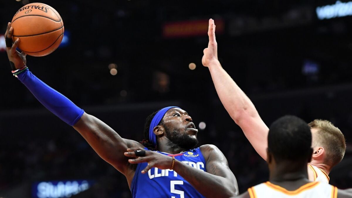 The Clippers' Montrezl Harrell takes a shot against Indiana at Staples Center on April 1 .