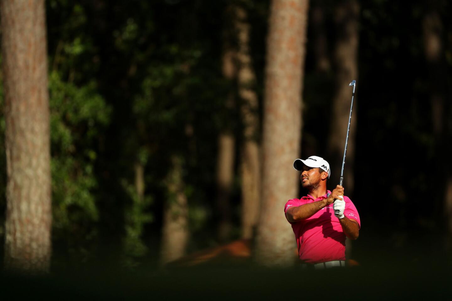 Jason Day of Australia plays a shot on the 15th hole Sunday during the final round of the Players Championship at TPC Sawgrass in Ponte Vedra Beach, Fla.