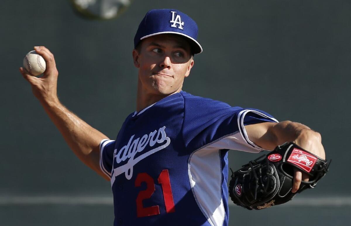 Dodgers pitcher Zack Greinke throws during spring training on Feb. 10.