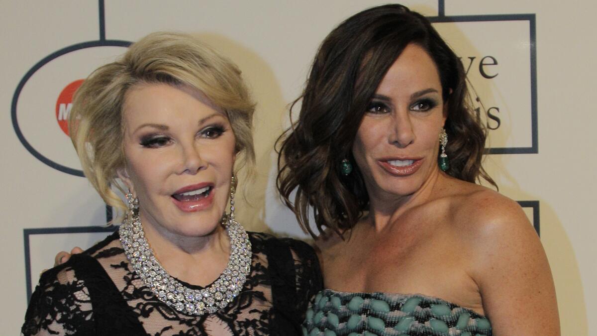 Melissa Rivers, right, said Thursday that mom Joan Rivers was "resting comfortably" and with her family at a New York City hospital after she was rushed there early Thursday morning.