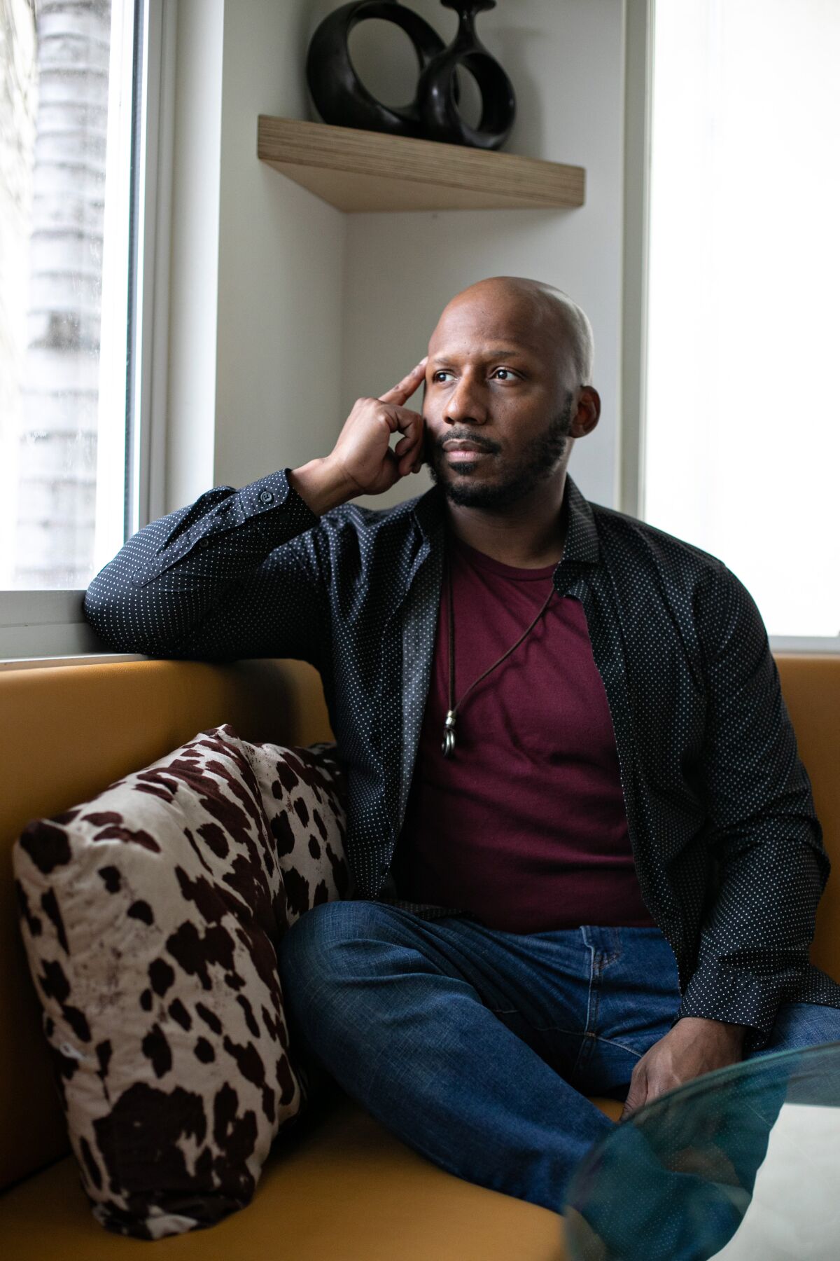 Playwright and actor Lee Edward Colston II sits for a portrait