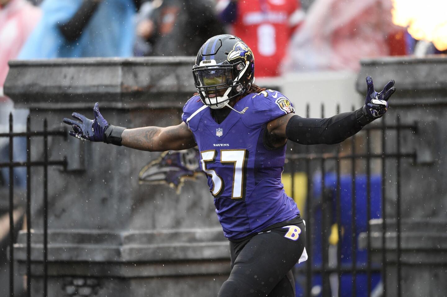 Baltimore Ravens inside linebacker C.J. Mosley runs onto the field before an NFL football game against the Tampa Bay Buccaneers, Sunday, Dec. 16, 2018, in Baltimore.