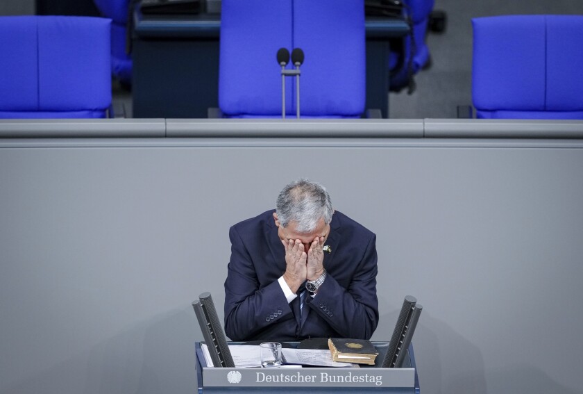 Mickey Levy, Speaker of the Knesset, reacts during the commemoration of the "Day of Remembrance of the Victims of National Socialism" in the German Bundestag, Berlin, Thursday, Jan.27, 2022. (Kay Nietfeld/dpa via AP)