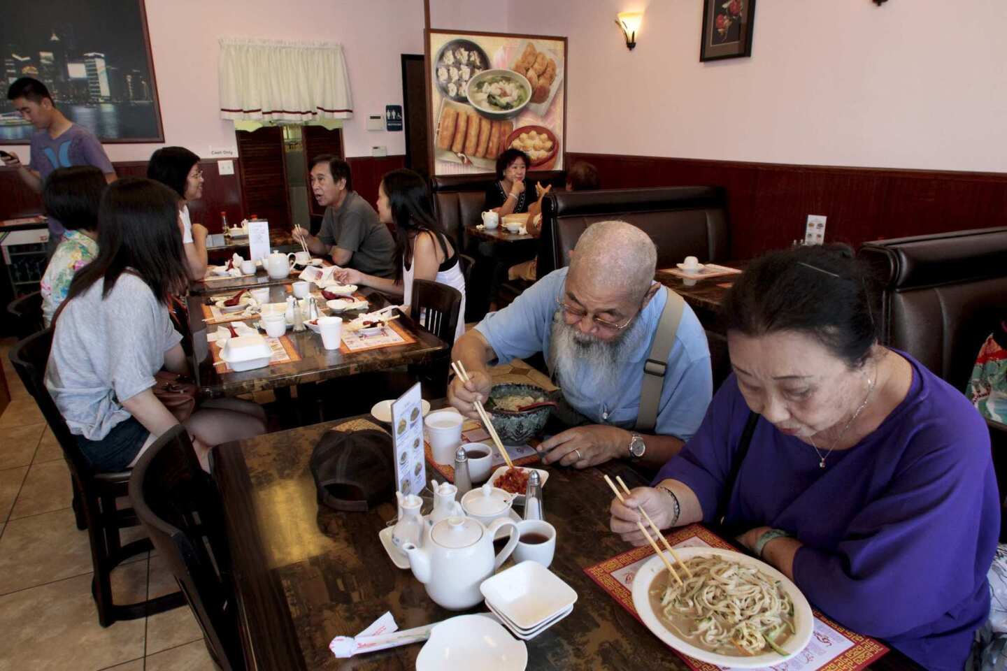 Diners enjoy the food food at Hui Tou Xiang Noodles House.