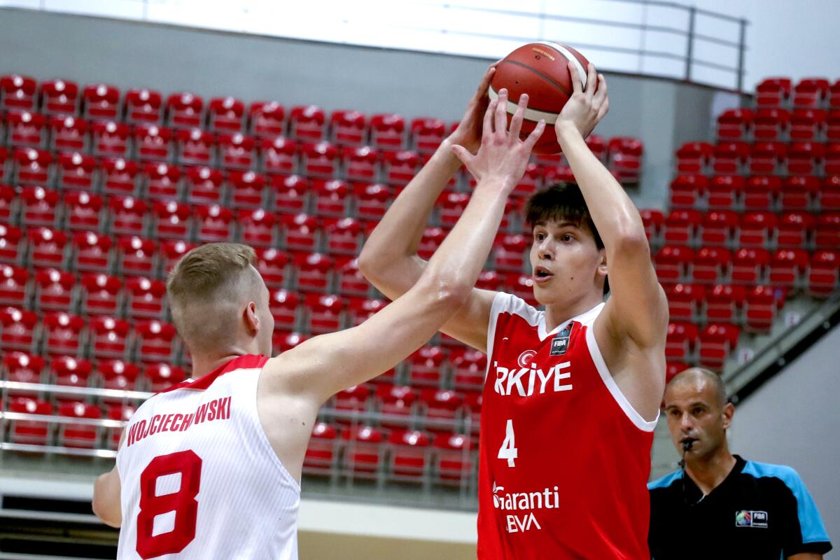 Turkey forward Berke Buyuktuncel looks to pass during a game against Poland in the under-18 European championships.