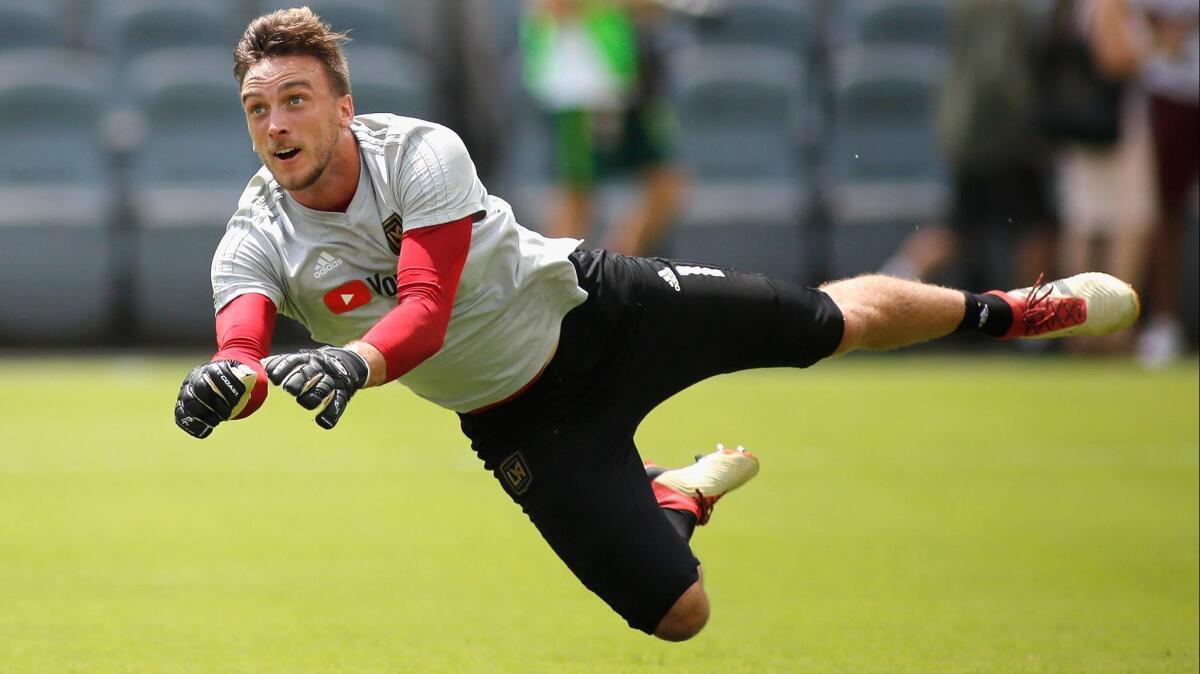 LAFC's Tyler Miller, shown during warmups, made four saves in LAFC’s season-opening victory over Sporting Kansas City.