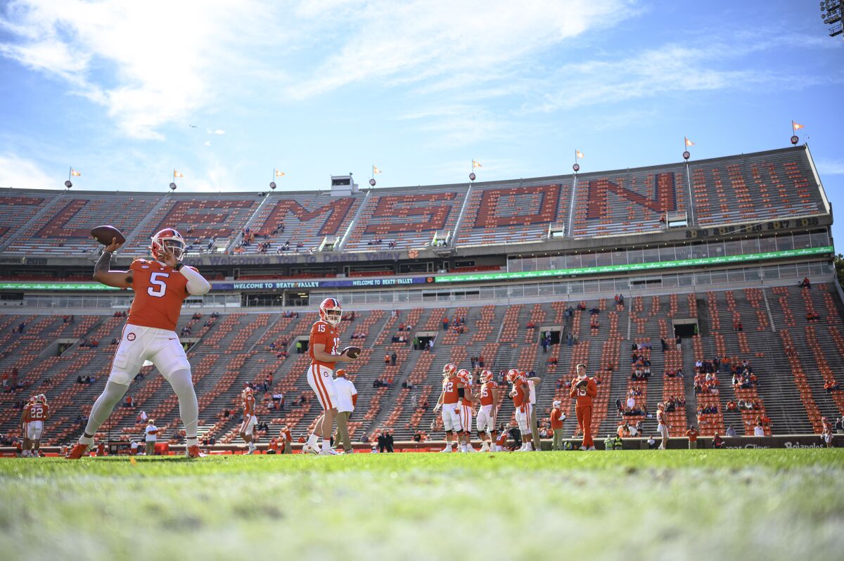 Clemson quarterback D.J. Uiagalelei (5) warms up before an NCAA college football game against Boston College on Saturday, Oct. 31, 2020, in Clemson, S.C. (Josh Morgan/Pool Photo via AP)