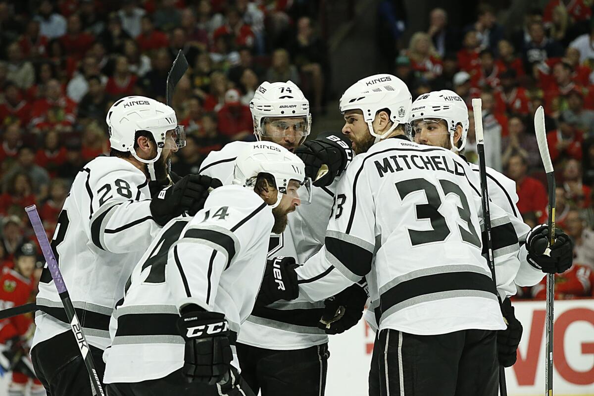 The Kings celebrate following a first-period goal against the Chicago Blackhawks in Game 7 of the Western Conference finals.