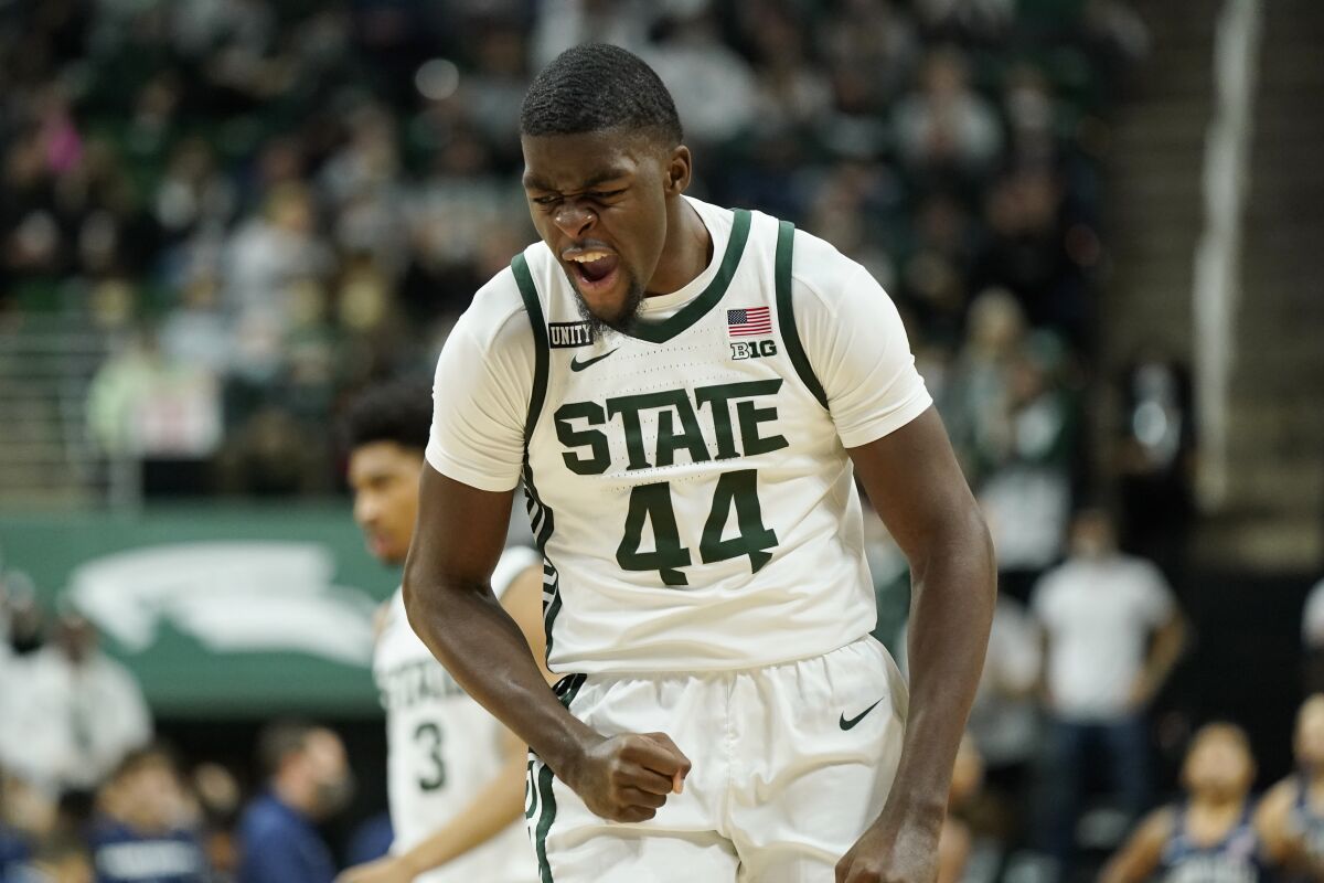 Michigan State forward Gabe Brown reacts after a play during the first half of an NCAA college basketball game against Penn State, Saturday, Dec. 11, 2021, in East Lansing, Mich. (AP Photo/Carlos Osorio)