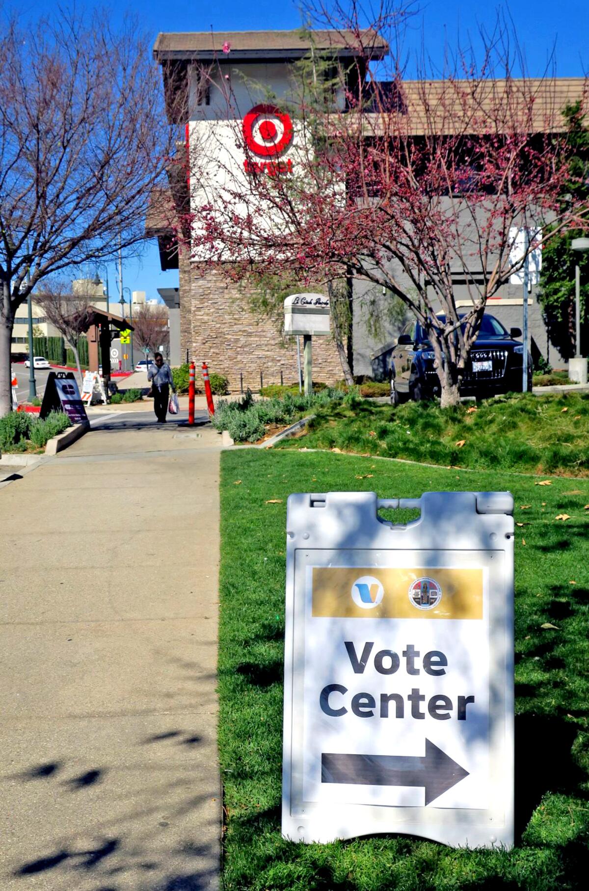 A sign outside La Cañada Flintridge City Hall points voters Tuesday to a new "flex voting center," which accepted ballots for Monday and Tuesday only.