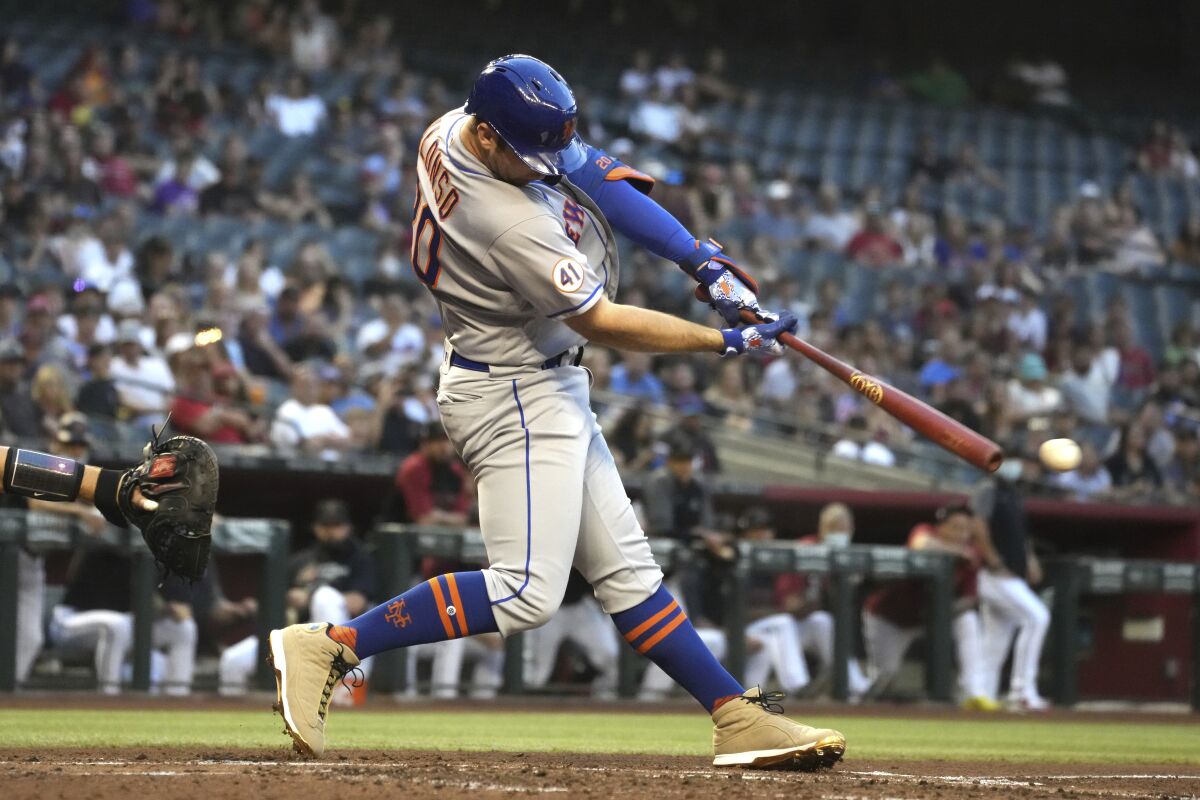 New York Mets' Pete Alonzo hits a two-run single against the Arizona Diamondbacks in the third inning during a baseball game, Monday, May 31, 2021, in Phoenix. (AP Photo/Rick Scuteri)