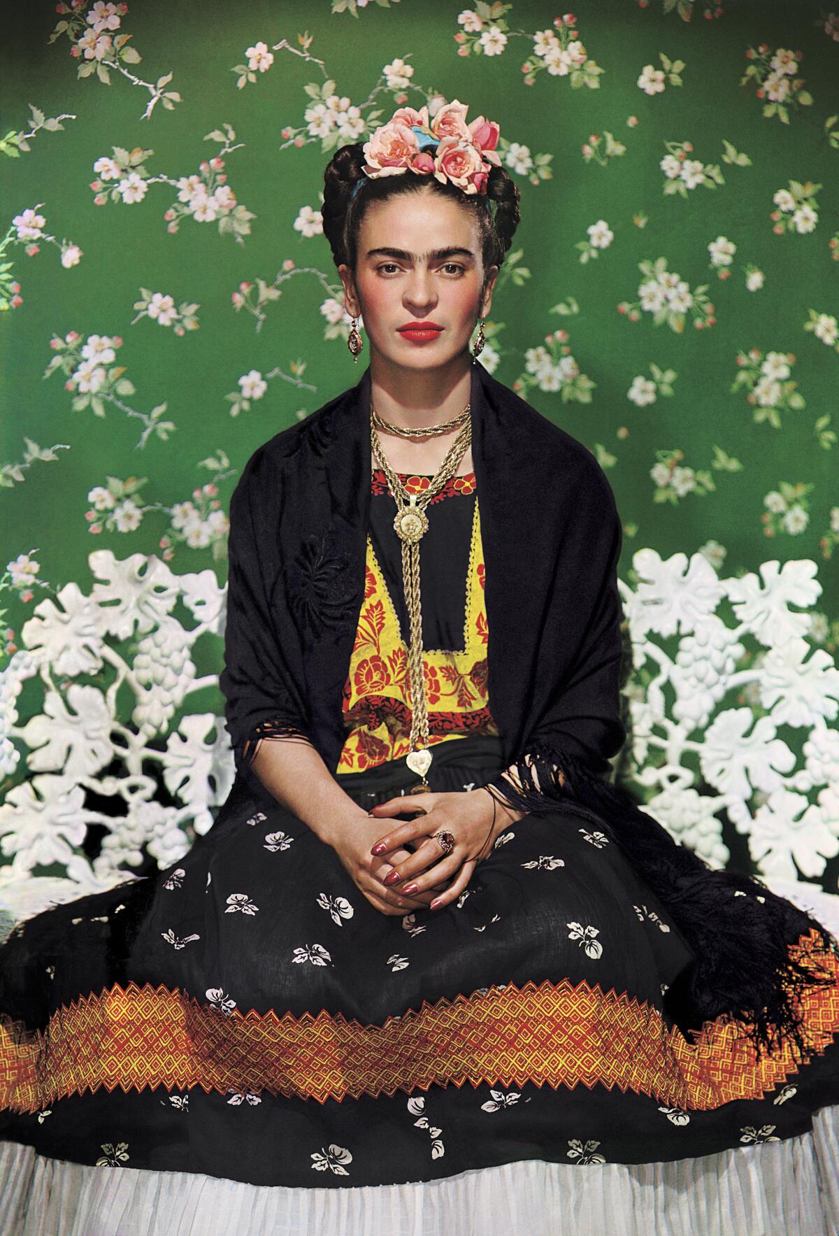 "Frida on White Bench, New York," a 1939 photograph by Nickolas Muray.