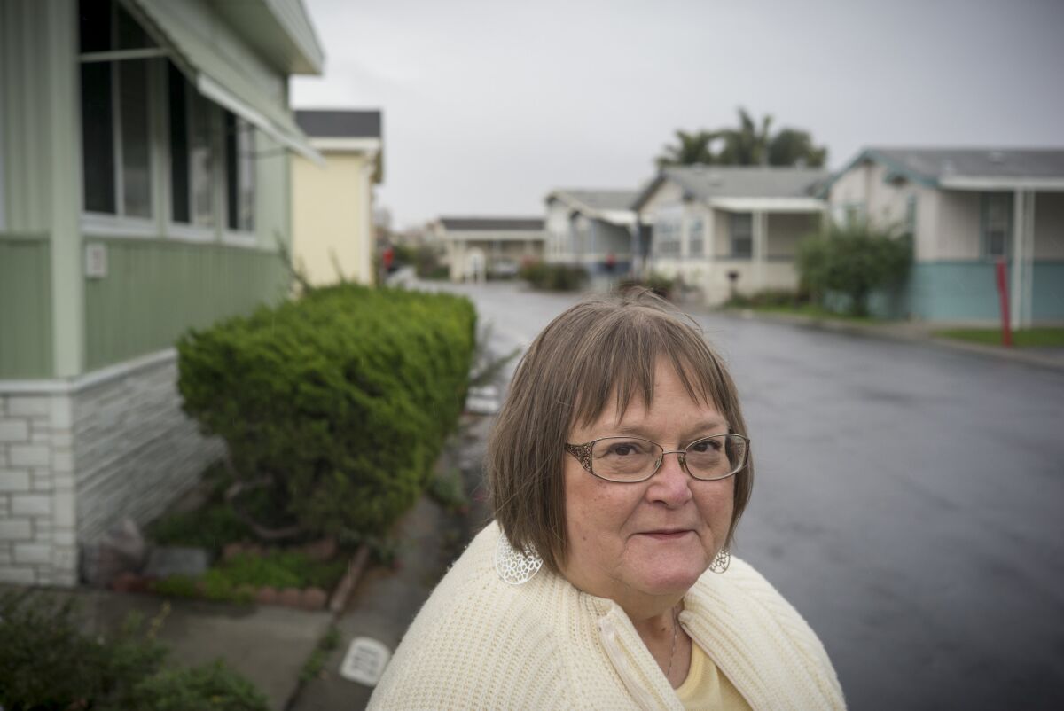 Judy Pavlick outside her mobile home in the Plaza del Rey park. She is leading a rent control campaign in Sunnyvale, Calif. (David Butow / For The Times)