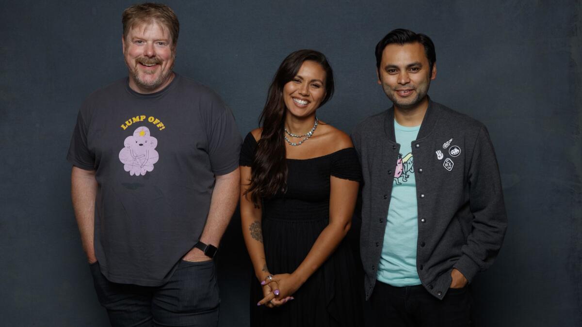 John DiMaggio, from left, Olivia Olson and Adam Muto from the television show "Adventure Time."