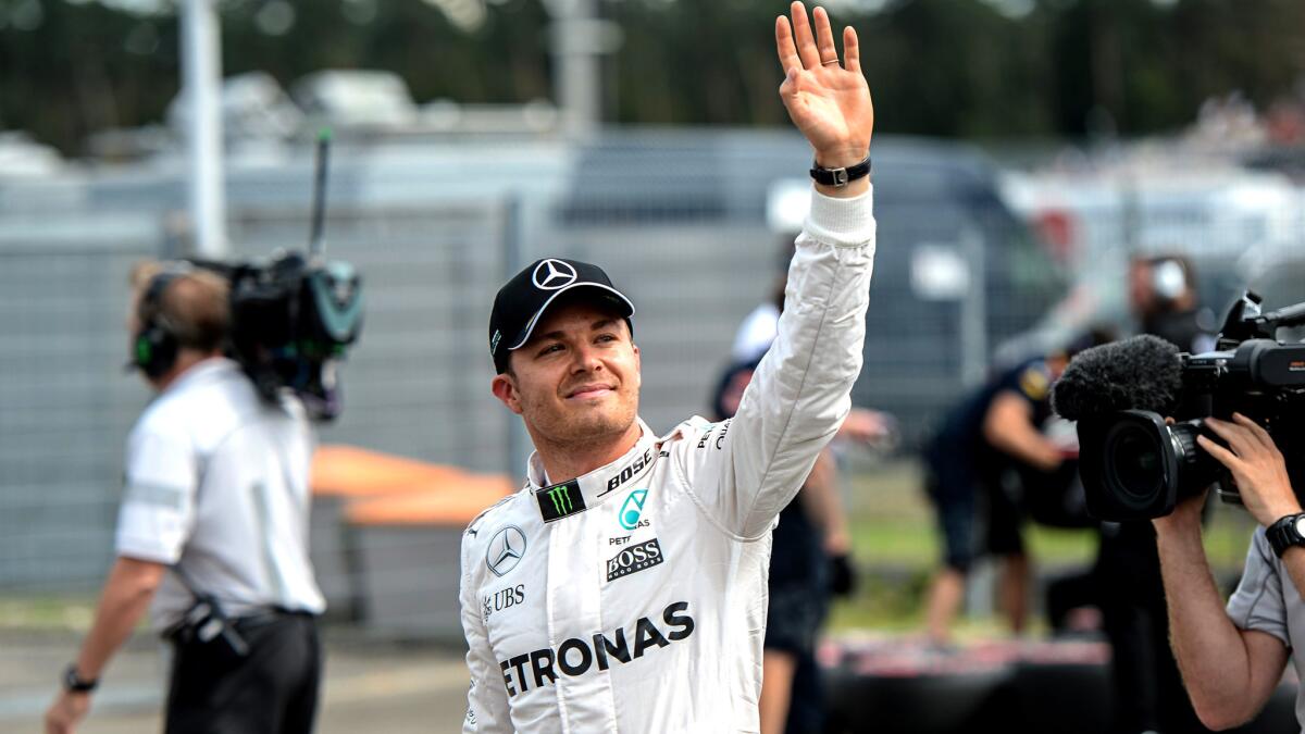 Formula One driver Nico Rosberg acknowledges fans Saturday after qualifying No. 1 for the German Grand Prix.