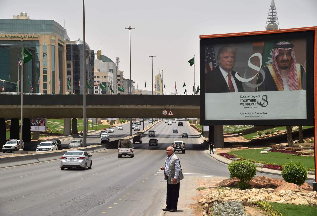A billboard on a main road in Riyadh, Saudi Arabia, has portraits of President Trump and King Salman.