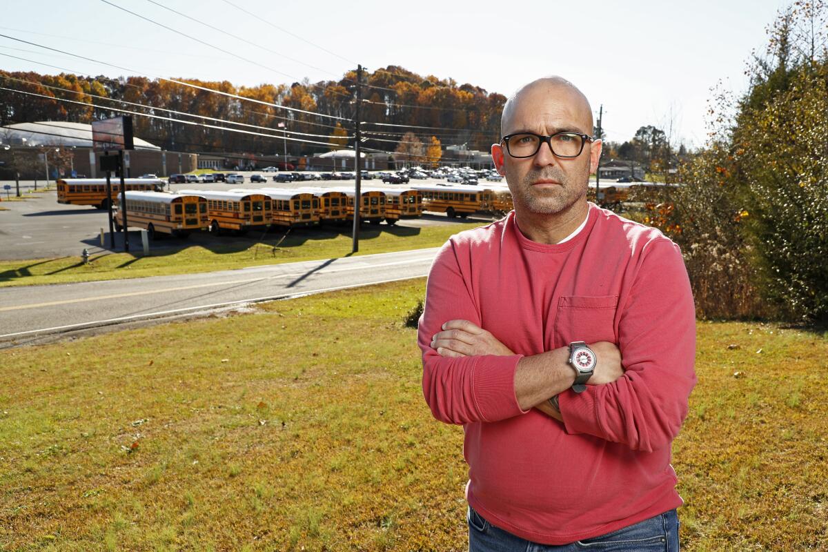 Matt Hawn stands across the street from the former Sullivan Central High School Nov. 12, 2021, in Kingsport, Tenn