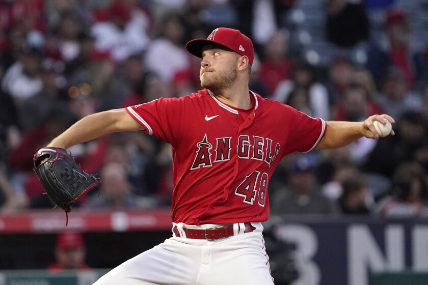 Angels starting pitcher Reid Detmers throws to the plate during the third inning.