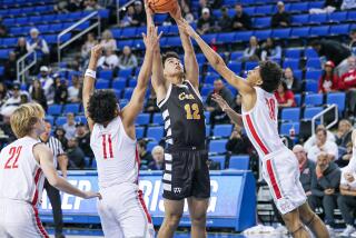 Cayman Martin of Crespi gets rebound against Mater Dei. Celts have a big week ahead.