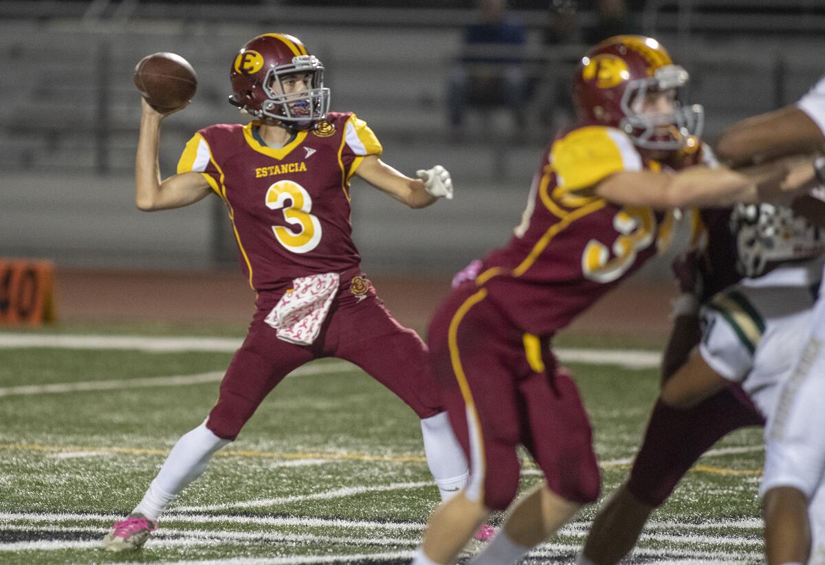 Estancia quarterback Cameron Knickerbocker, shown passing against Saddleback on Oct. 10, had two touchdown passes in the Eagles' 34-0 shutout of the Roadrunners.